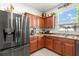 Modern kitchen with granite countertops and stainless steel appliances at 1066 Krenson Woods Rd, Lakeland, FL 33813