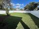 Backyard features a tall white privacy fence and plenty of green space at 1701 Ferris Ave, Orlando, FL 32803