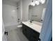 Bathroom featuring vanity, modern fixtures, and shower/bath combo at 1701 Ferris Ave, Orlando, FL 32803