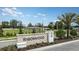 Ironwood community entrance with landscaping and signage at 1924 Rosewood Cir, Lakeland, FL 33810