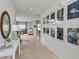 Bright entryway with tile flooring and gallery wall at 1924 Rosewood Cir, Lakeland, FL 33810