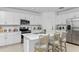 Modern kitchen with white cabinets and island at 1924 Rosewood Cir, Lakeland, FL 33810