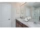 Double vanity bathroom with a walk-in shower and modern finishes at 1944 Rosewood Cir, Lakeland, FL 33810