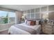 Main bedroom with gray headboard and decorative pillows at 1944 Rosewood Cir, Lakeland, FL 33810