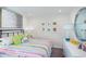 Bright bedroom with colorful bedding and a cheerful atmosphere at 1944 Rosewood Cir, Lakeland, FL 33810