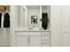 Modern bathroom vanity with white cabinets and quartz countertop at 2017 Lasso Loop, Eagle Lake, FL 33839