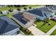 House with solar panels and driveway, viewed from above at 2871 Parkfield Rd, St Cloud, FL 34772