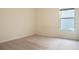 Spacious bedroom with a large window offering natural light at 2871 Parkfield Rd, St Cloud, FL 34772