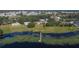 Scenic view of lakefront home featuring private dock access at 958 Lake Deeson Pt, Lakeland, FL 33805