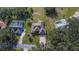 Aerial view of the property highlighting the home's layout, landscaping, and neighborhood at 958 Lake Deeson Pt, Lakeland, FL 33805