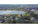 Aerial view showcases the property in its lakeside neighborhood at 958 Lake Deeson Pt, Lakeland, FL 33805