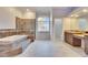 Elegant bathroom featuring a soaking tub, a separate shower, and double vanities at 958 Lake Deeson Pt, Lakeland, FL 33805