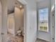 Bathroom with window, toilet and shower at 958 Lake Deeson Pt, Lakeland, FL 33805