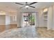 Dining area with tile floor, sliding doors to patio, and view of backyard at 958 Lake Deeson Pt, Lakeland, FL 33805