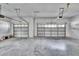 Spacious garage with two bays and concrete floor at 958 Lake Deeson Pt, Lakeland, FL 33805