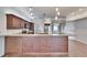 Modern kitchen with an island and dark wood cabinets at 958 Lake Deeson Pt, Lakeland, FL 33805