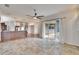 Spacious living room with tile floors and sliding glass doors to an outdoor patio at 958 Lake Deeson Pt, Lakeland, FL 33805