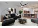 Comfortable living room with modern decor, with views to kitchen area, for easy entertaining at 958 Lake Deeson Pt, Lakeland, FL 33805