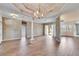 Bright living room with high ceilings and chandelier at 958 Lake Deeson Pt, Lakeland, FL 33805