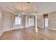 Spacious living room with wood-look floors and high ceilings at 958 Lake Deeson Pt, Lakeland, FL 33805