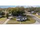 Aerial view showing house, yard, and neighborhood setting at 100 Cordova Rd, Auburndale, FL 33823