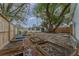 Large backyard with garden beds and a play pool at 100 Cordova Rd, Auburndale, FL 33823