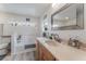 Clean bathroom with updated vanity and a bathtub at 100 Cordova Rd, Auburndale, FL 33823