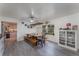 Farmhouse-style dining room with long wooden table at 100 Cordova Rd, Auburndale, FL 33823