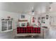 Cozy living room with fireplace and comfortable seating at 100 Cordova Rd, Auburndale, FL 33823