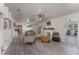 Spacious living room with fireplace and large windows at 100 Cordova Rd, Auburndale, FL 33823