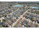 Aerial view of a residential neighborhood with many screened-in pools at 108 Emeraldview Ave, Davenport, FL 33897