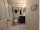 Clean bathroom with shower, toilet and vanity at 108 Emeraldview Ave, Davenport, FL 33897