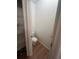 Small bathroom with toilet and linen closet at 108 Emeraldview Ave, Davenport, FL 33897