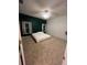 Spacious bedroom with carpet and ceiling fan at 108 Emeraldview Ave, Davenport, FL 33897