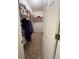 Large walk-in closet with ample shelving and hanging space at 108 Emeraldview Ave, Davenport, FL 33897