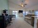 Spacious Gathering room with pool view and plenty of natural light at 108 Emeraldview Ave, Davenport, FL 33897