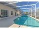 Sparkling screened-in pool offers a refreshing retreat and enhances outdoor enjoyment at 108 Emeraldview Ave, Davenport, FL 33897