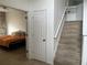 Upstairs hall with linen closet and bedroom access at 108 Emeraldview Ave, Davenport, FL 33897