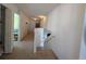 Upstairs hallway with access to bedrooms and stairs at 108 Emeraldview Ave, Davenport, FL 33897