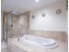 Relaxing bathroom with soaking tub and shower at 241 Riverside Dr # 1203, Daytona Beach, FL 32117