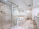 Spa-like bathroom with soaking tub and shower at 241 Riverside Dr # 1203, Daytona Beach, FL 32117