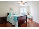 Bright bedroom with hardwood floors and water views at 241 Riverside Dr # 1203, Daytona Beach, FL 32117