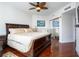 Bright bedroom with king-size bed and hardwood floors at 241 Riverside Dr # 1203, Daytona Beach, FL 32117