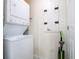 Convenient laundry room with stackable washer and dryer at 241 Riverside Dr # 1203, Daytona Beach, FL 32117