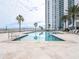 Relaxing pool area with water views at 241 Riverside Dr # 1203, Daytona Beach, FL 32117