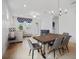 Dining area with dark wood table and gray leather chairs at 2557 Village Lakes Blvd, Lakeland, FL 33805