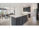 Modern kitchen with white quartz countertops and dark cabinetry at 2557 Village Lakes Blvd, Lakeland, FL 33805