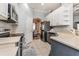 Kitchen with stainless steel appliances and blue cabinets at 1046 Island Pointe Dr, Winter Garden, FL 34787