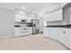 Kitchen with white cabinets, granite counters, and stainless steel appliances at 2003 Rocky Pointe Dr, Lakeland, FL 33813