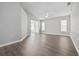 Spacious living room with light gray walls and wood-look flooring at 2003 Rocky Pointe Dr, Lakeland, FL 33813